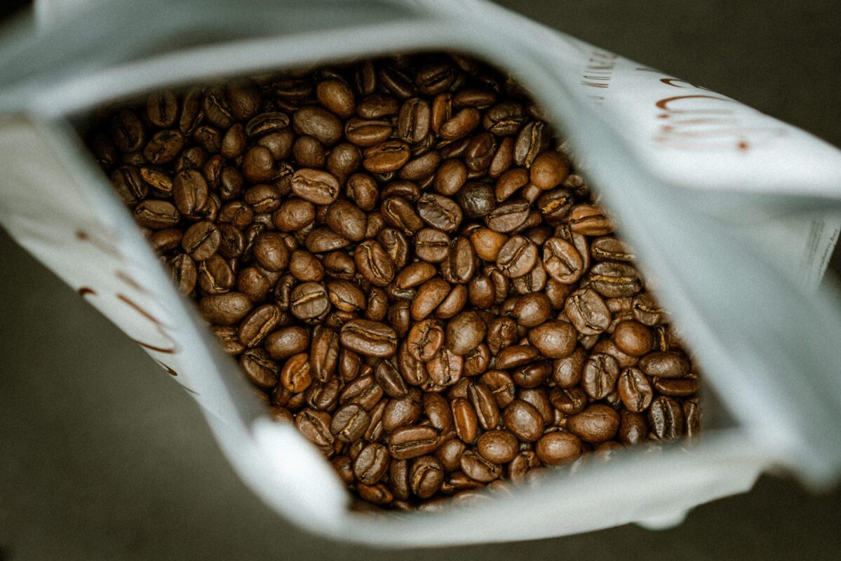 Freshly roasted coffee beans in an airtight container