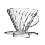 Coffee drip cup filter sitting on top of a mug