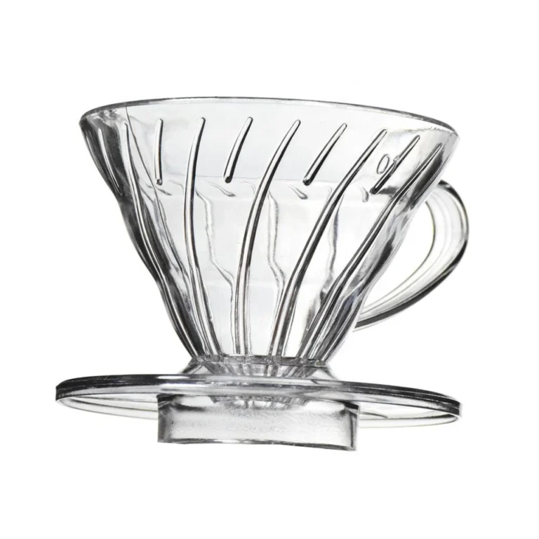 Coffee drip cup filter sitting on top of a mug