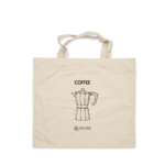 Tote bag being carried with coffee bags and groceries