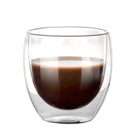Espresso poured in double wall glass coffee cup