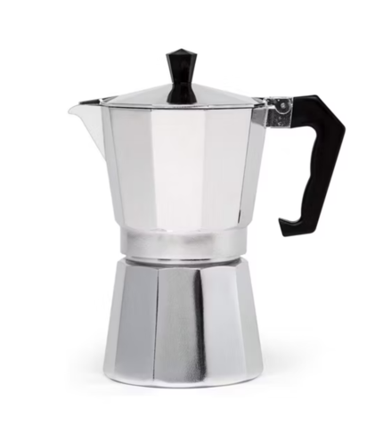 Cup of coffee poured from moka pot stovetop espresso maker