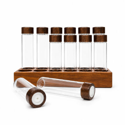 Funnel filling glass dosing tube with coffee beans